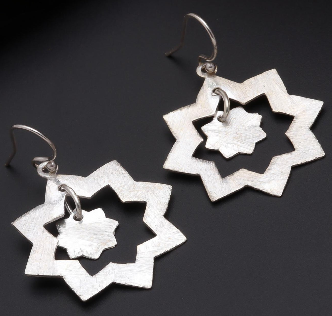 Textured Star Silver Earrings..