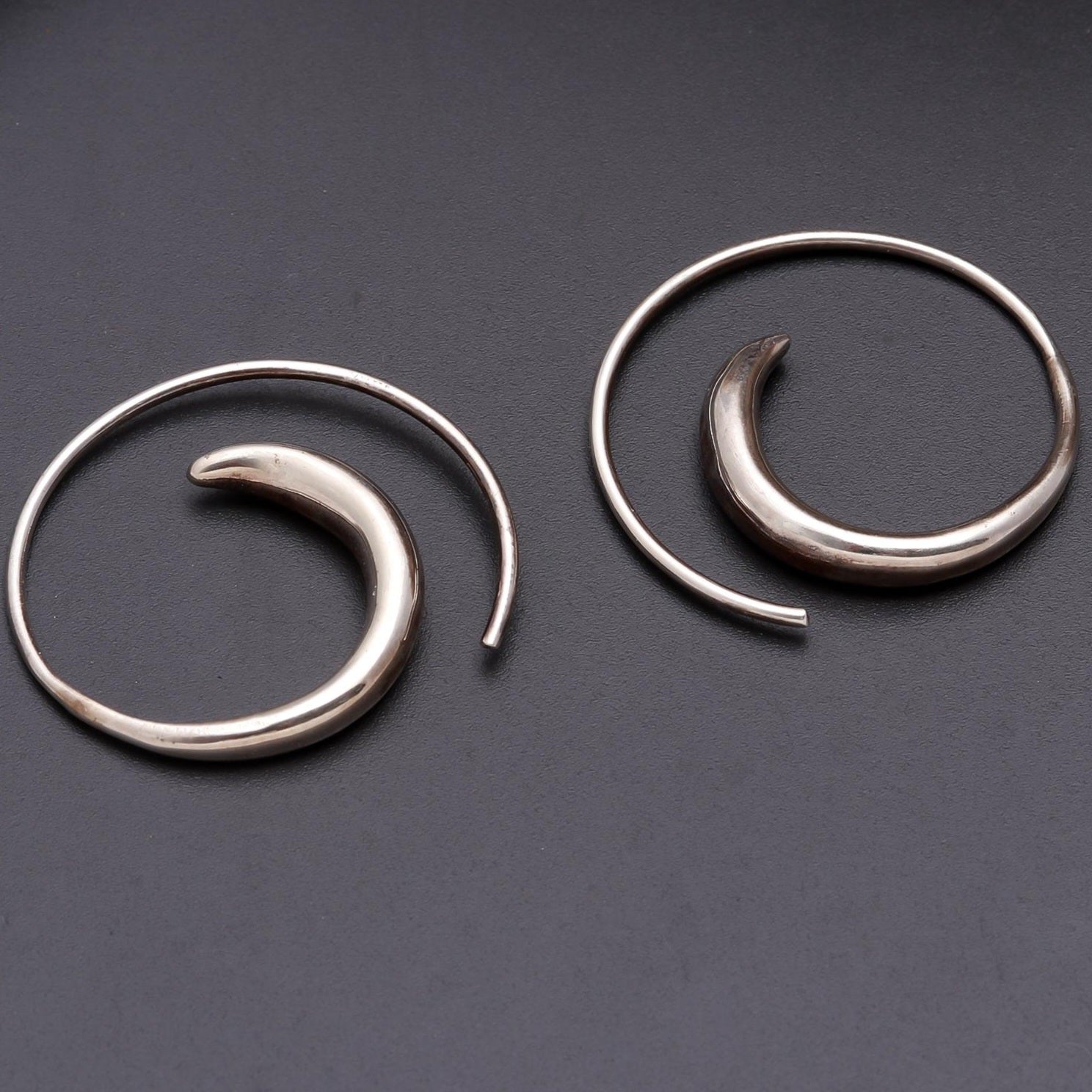 Twirl Silver Earrings.